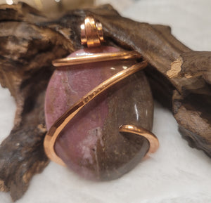Rhodonite Pendant Necklace, Pink Oval Shaped Natural Stone wrapped in Copper